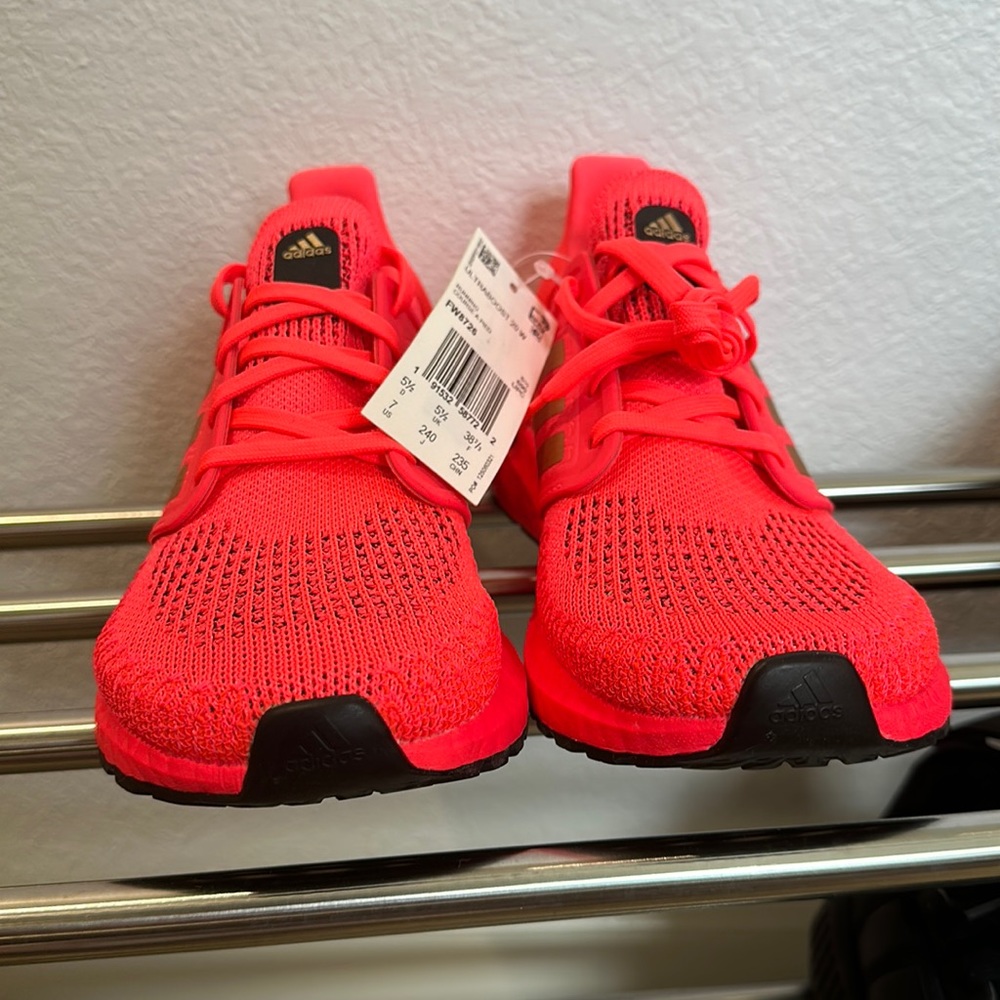 Brand new. Women size 7. Adidas Ultraboost 20 Signal Coral